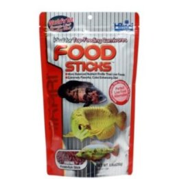 Hikari Food Sticks kelluva täysravinto arovaanoille ja muille pinnalta ruokaileville petokaloille.